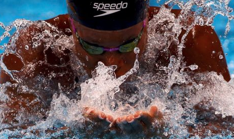 Jamaican Olympian Alia Atkinson tied the World Record in the 100  meters breaststroke on day 1 of the 2016 FINA World Cup’s opening stop in 